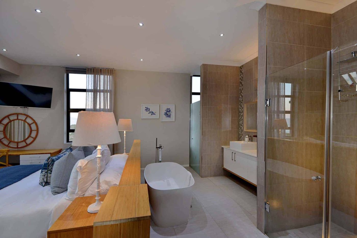 The freestanding bath and walk-in shower in an Executive Room