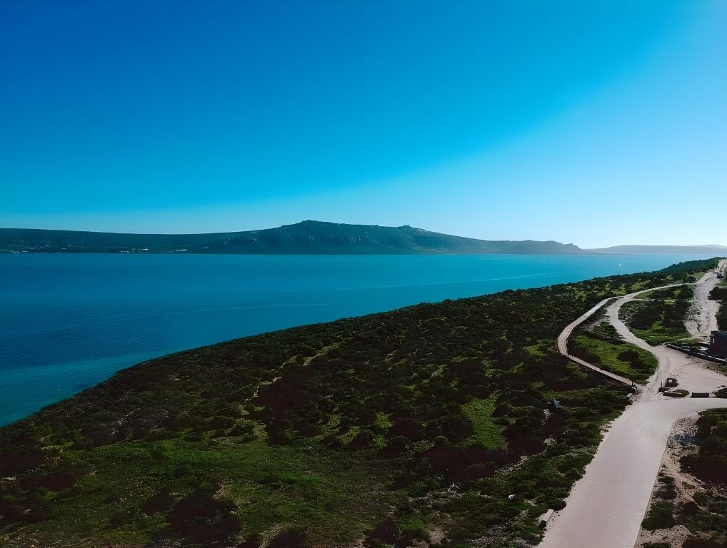 The lagoon and the hill across the water, from above the hotel