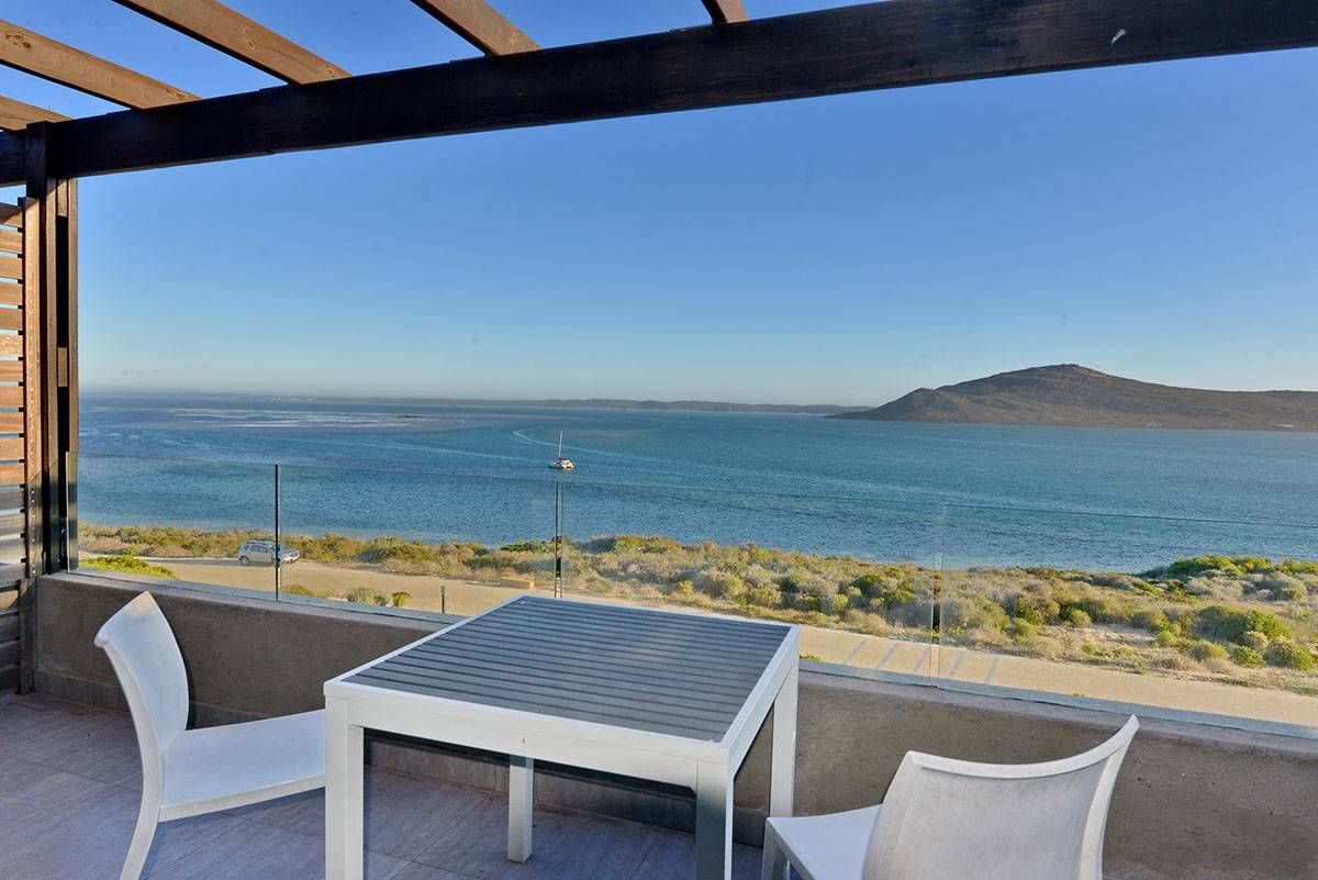 The balcony of a Luxury Room, looking across the lagoon