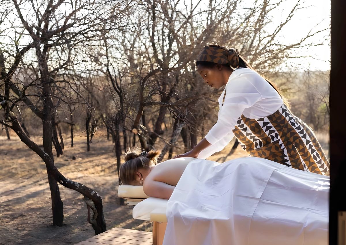 A massage on a deck among the trees