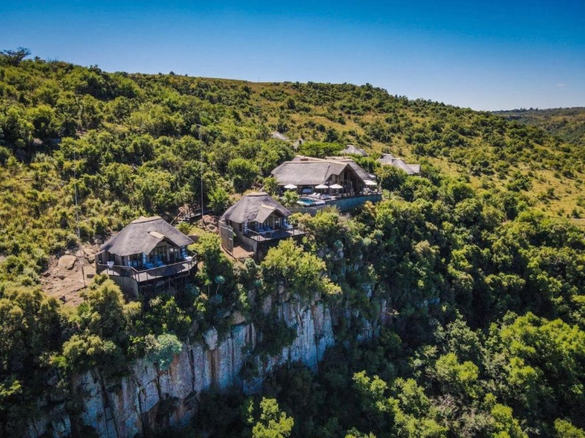 Esiweni from the air, its suites strung along the cliff